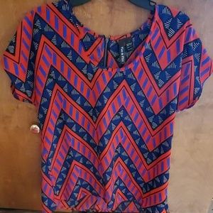 Blue, red, and black patterned top size medium